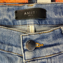Load image into Gallery viewer, AMIRI Hibiscus Stencil Skinny Jeans Size 31”