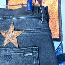 Load image into Gallery viewer, Amiri Leather Star Patch “Chemist” Jeans Size 33”