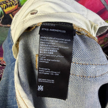 Load image into Gallery viewer, Amiri MA Quad Artpatch Skinny Jeans Size 30”
