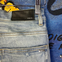 Load image into Gallery viewer, Amiri Light Blue Leopard Print Thrasher Jeans Size 30
