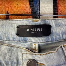 Load image into Gallery viewer, Amiri MX-1 Ripped Knee Light Blue Jeans Size 33”

